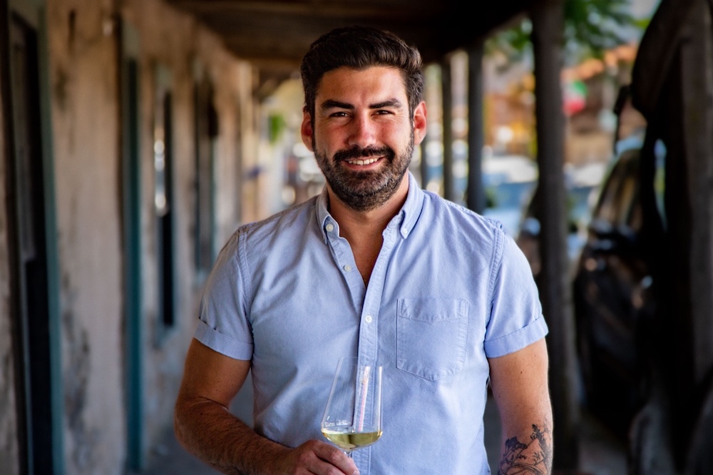 Grant Wood enjoying a glass of wine outside the Bedrock tasting room in downtown Sonoma.